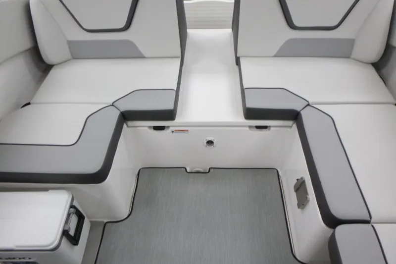 Slide: The Image of Interior seating of 2026 Yamaha Boats AR220, featuring modern gray and white upholstery. - 15