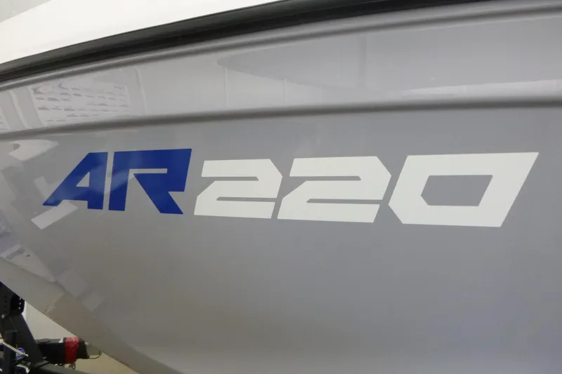 Slide: The Image of Close-up of 2026 Yamaha Boats AR220 model logo on boat hull. - 17