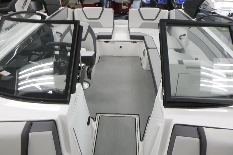 Slide: The Image of Interior view of 2026 Yamaha Boats AR220, featuring sleek seating and modern design. - 6