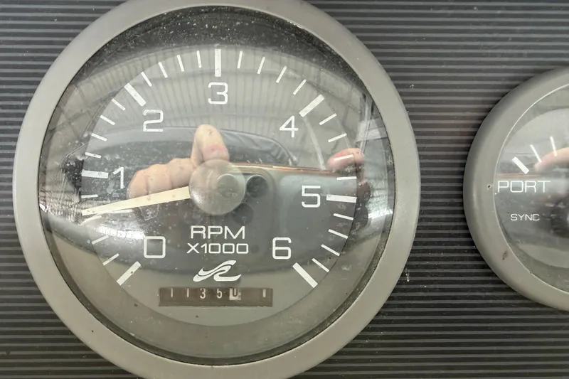 Slide: The Image of Tachometer of 1994 Sea Ray Sundancer 330 showing RPM readings. - 13