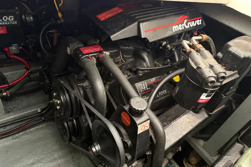 Slide: The Image of Engine compartment of a 1994 Sea Ray Sundancer 330 with MerCruiser components. - 35