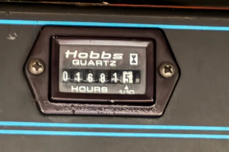 Slide: The Image of Hobbs Quartz hour meter showing 168.15 hours on a 1994 Sea Ray Sundancer 330. - 38