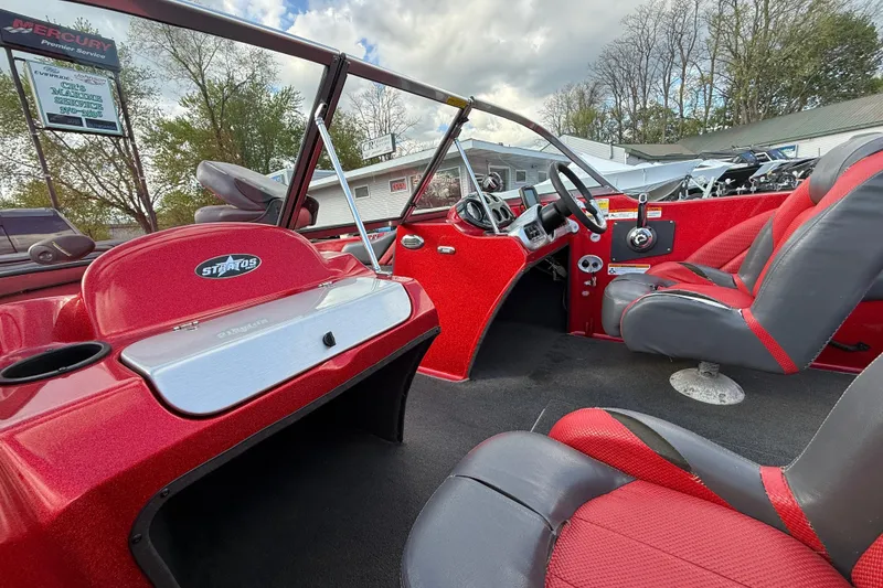 Slide: The Image of 2013 Stratos 486 Ski-N-Fish boat interior with red and gray seating. - 15