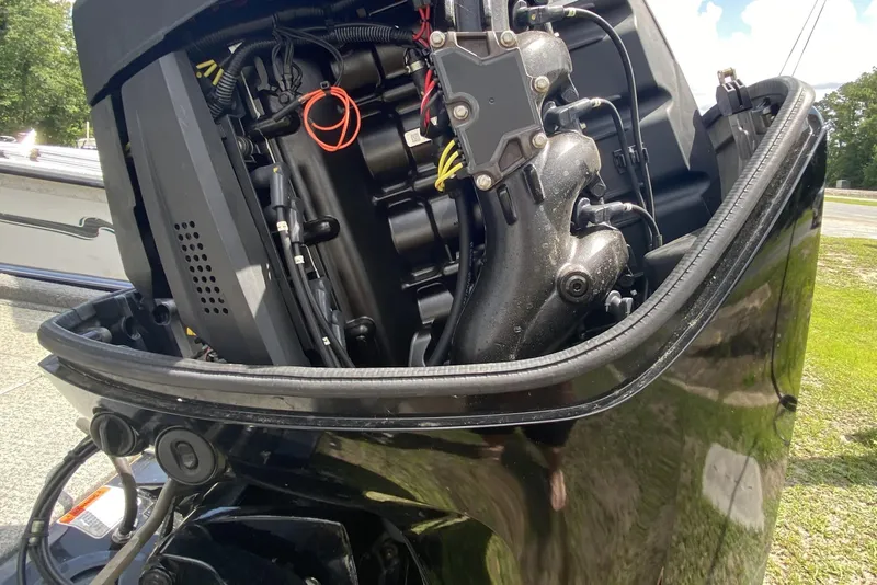 Slide: The Image of 2020 Tracker Pro Team 175 TXW boat engine close-up, showcasing intricate mechanical details. - 14