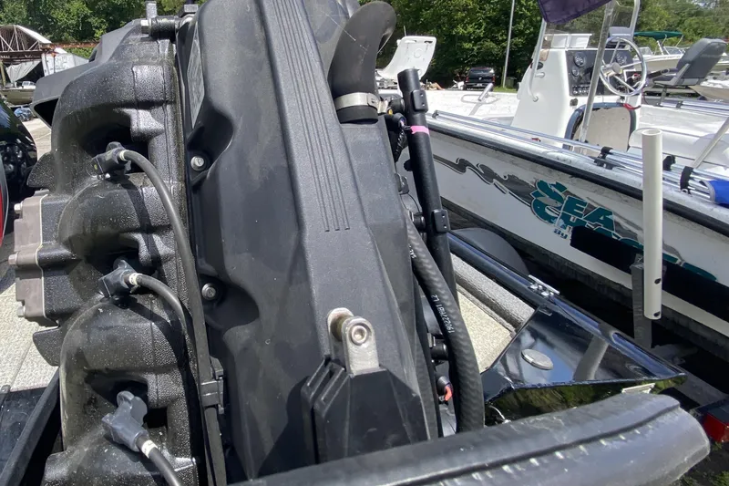 Slide: The Image of 2020 Tracker Pro Team 175 TXW boat engine close-up with surrounding boats. - 15