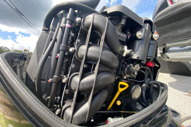 Slide: The Image of 2020 Tracker Pro Team 175 TXW engine close-up under a clear sky. - 16