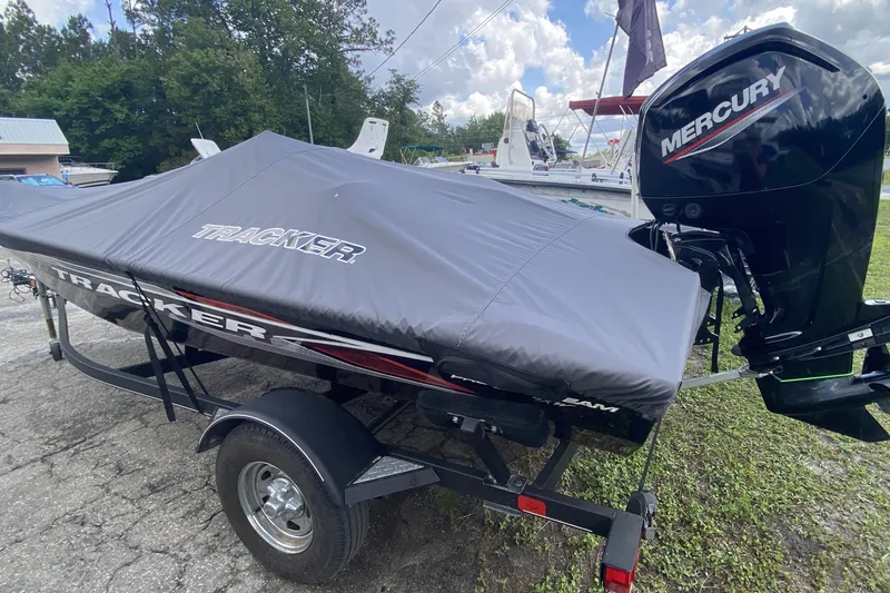 Slide: The Image of 2020 Tracker Pro Team 175 TXW boat with cover and Mercury outboard motor. - 4