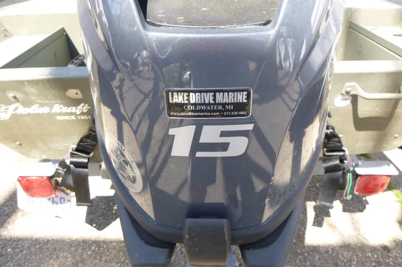 Slide: The Image of 2014 Polar Kraft Jon MV 1448 LW boat with Lake Drive Marine sticker and 15 horsepower engine. - 6