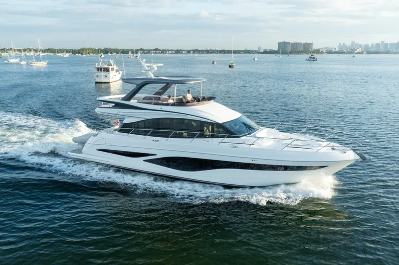 Slide: The Image of Luxurious 2025 Princess F65 yacht cruising on serene waters, showcasing sleek design and elegance. - 1