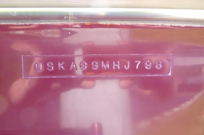 Slide: The Image of 1998 Maxum 2300 SC boat hull identification number (HIN) close-up. - 15