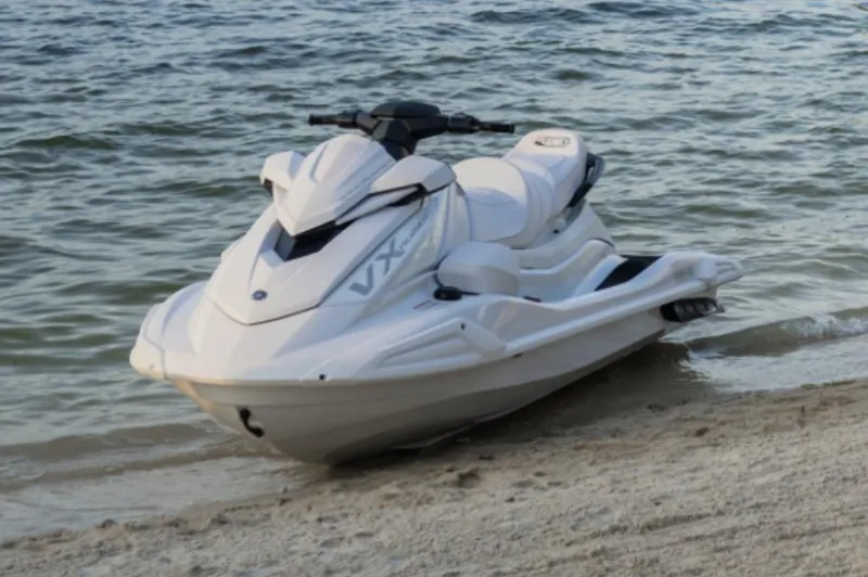 Slide: The Image of Manufacturer Provided Image: 2025 Yamaha WaveRunner VX Cruiser on sandy beach by the water. - 3