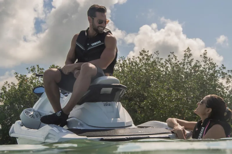 Slide: The Image of Manufacturer Provided Image: Man and woman enjoying a 2025 Yamaha WaveRunner VX Cruiser on a sunny day. - 4