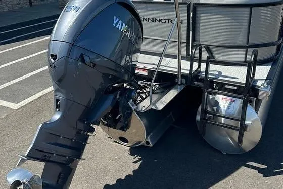 Slide: The Image of 2026 Bennington 22 S Quad Bench pontoon boat with Yamaha outboard motor. - 13