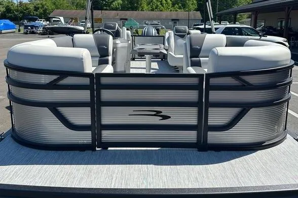 Slide: The Image of 2026 Bennington 22 S Quad Bench pontoon boat with sleek seating and modern design. - 15