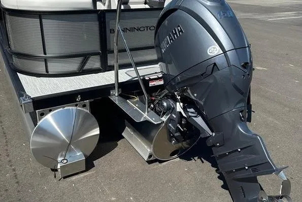 Slide: The Image of 2026 Bennington 22 S Quad Bench pontoon boat with Yamaha outboard motor. - 3