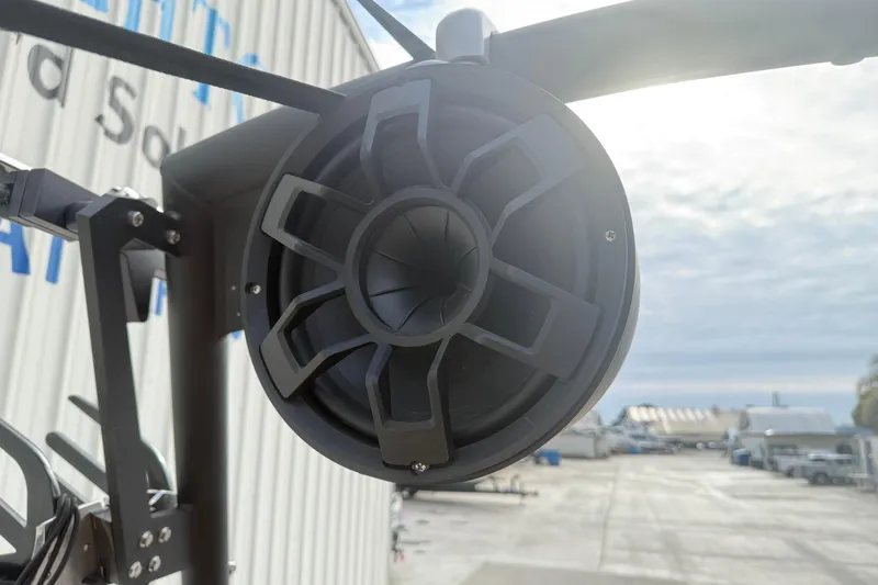 Slide: The Image of Outdoor speaker on Axis T250, 2022 model, mounted with industrial background. - 21