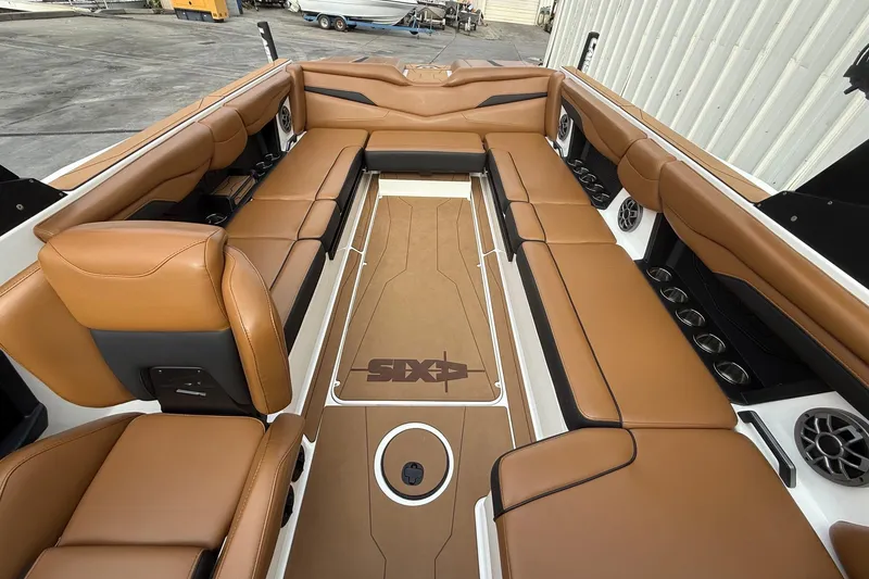 Slide: The Image of Luxurious interior of 2022 Axis T250 boat with tan leather seating and modern design. - 9
