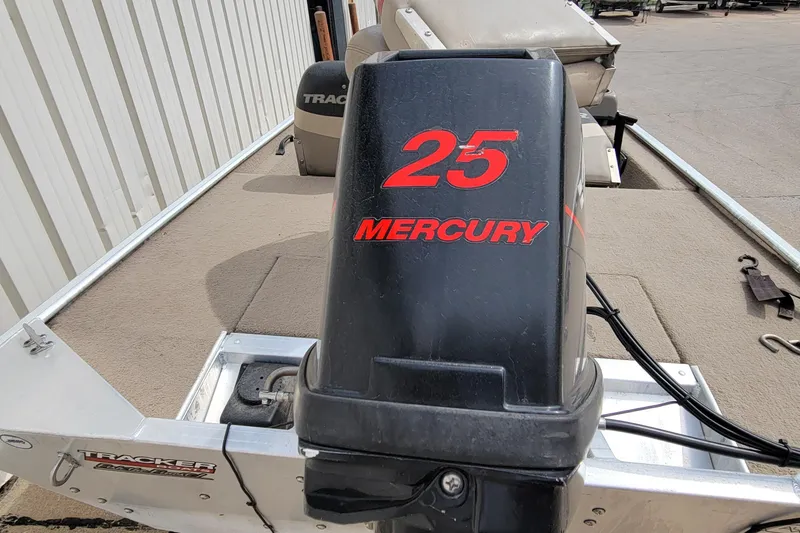 Slide: The Image of 2003 Tracker Pro Team 165 boat with Mercury 25 horsepower engine. - 10