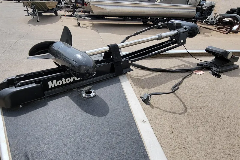 Slide: The Image of Trolling motor on a 2003 Tracker Pro Team 165 boat, parked on concrete. - 16