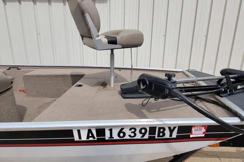 Slide: The Image of 2003 Tracker Pro Team 165 boat with seat and trolling motor, registration IA 1639 BY. - 17