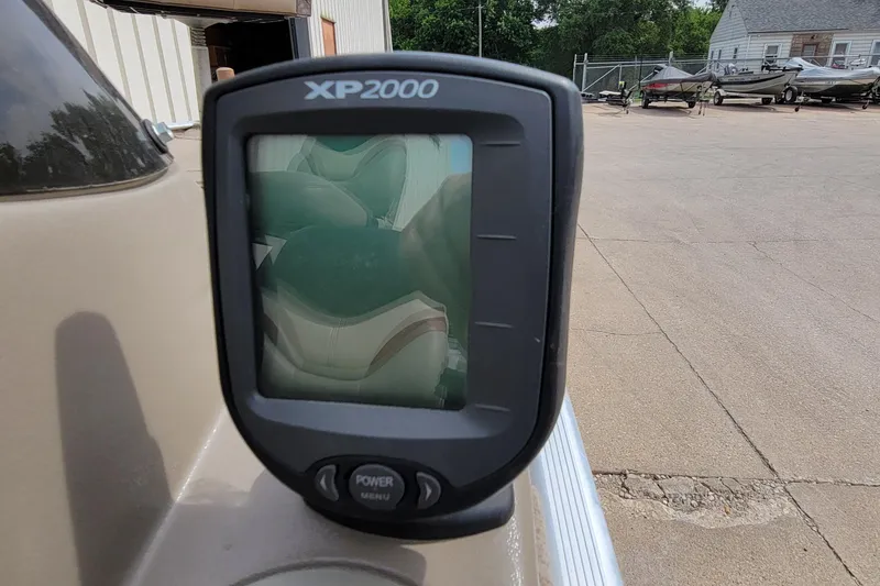 Slide: The Image of Fishfinder XP2000 on 2003 Tracker Pro Team 165 boat, outdoor setting. - 19