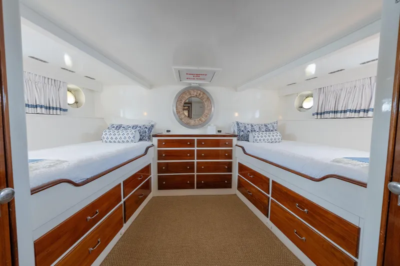Slide: The Image of Interior of 1939 Mathis Trumpy Fantail Houseboat with twin beds and wooden cabinetry. - 10