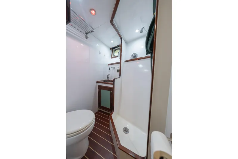 Slide: The Image of Bathroom interior of 1939 Mathis Trumpy Fantail Houseboat with shower and toilet. - 23