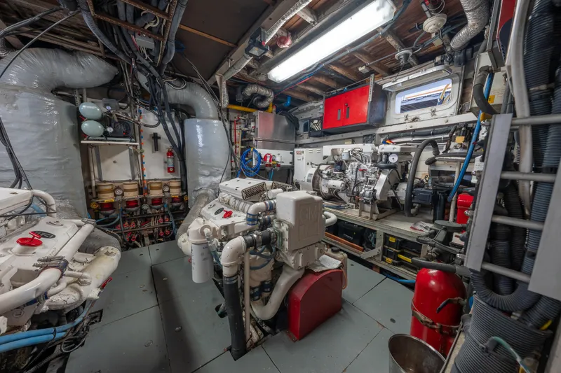 Slide: The Image of Engine room of a 1939 Mathis Trumpy Fantail Houseboat, showcasing machinery and equipment. - 25