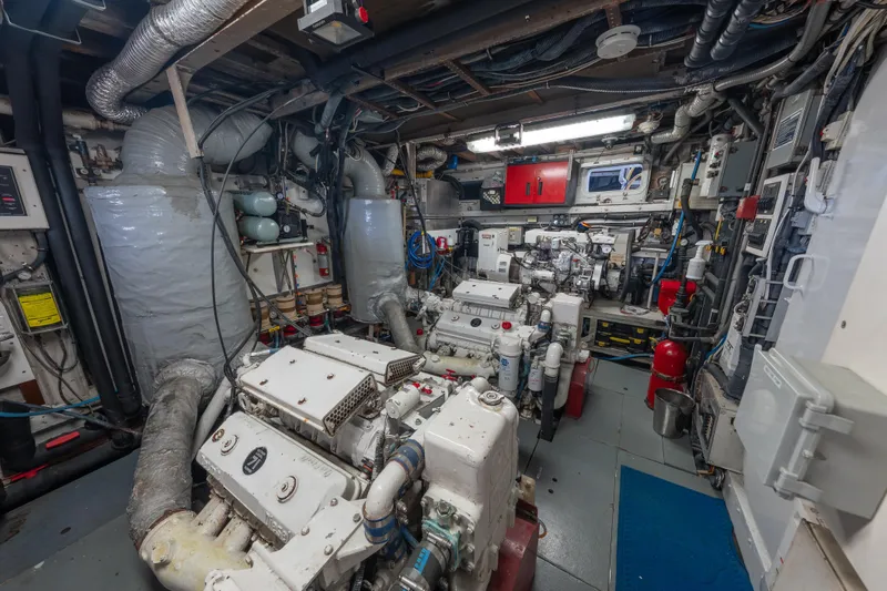 Slide: The Image of Engine room of a 1939 Mathis Trumpy Fantail Houseboat, showcasing machinery and equipment. - 27