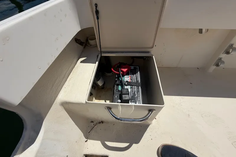 Slide: The Image of Battery compartment of a 2006 Parker 23SE Center Console boat. - 10