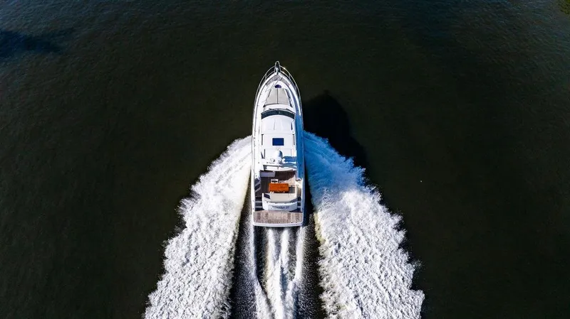 Slide: The Image of Aerial view of 2016 Beneteau GRAN TURISMO 49 yacht cruising on open water. - 16