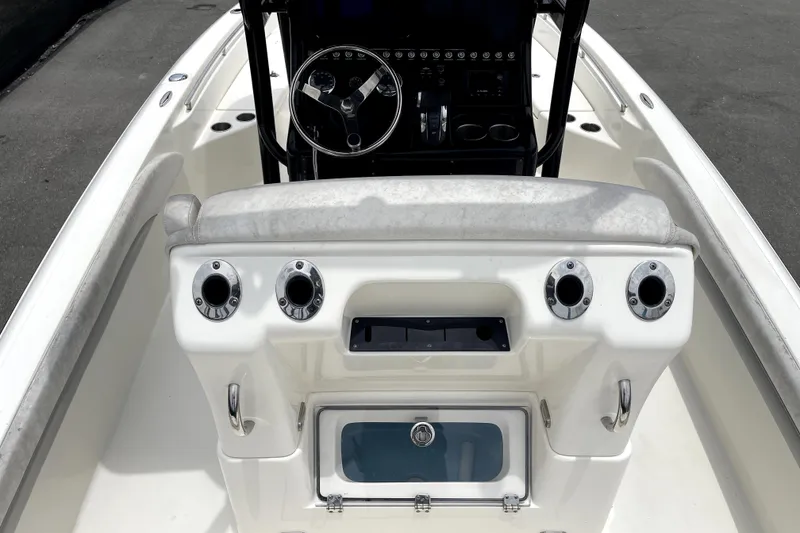 Slide: The Image of 2019 ShearWater 25 LTZ boat console with steering wheel and controls. - 15