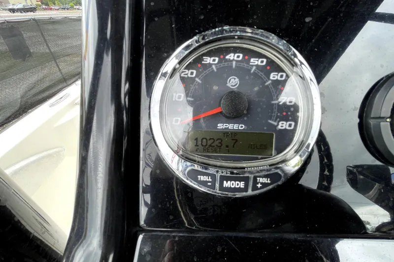 Slide: The Image of Speedometer of 2019 ShearWater 25 LTZ boat showing 1023.7 miles. - 22