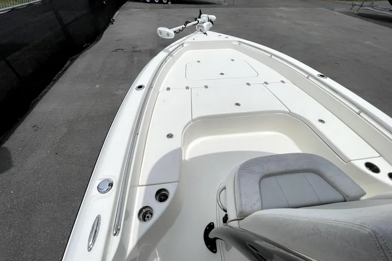 Slide: The Image of 2019 ShearWater 25 LTZ boat deck with seating and storage compartments. - 30