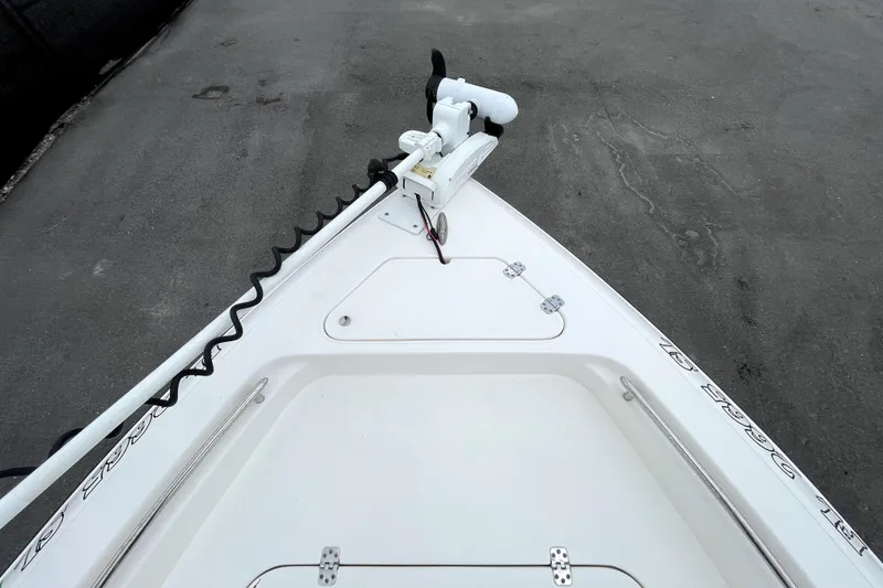 Slide: The Image of Bow view of a 2019 ShearWater 25 LTZ boat with trolling motor. - 34