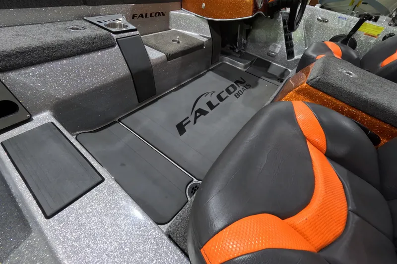 Slide: The Image of 2021 Falcon Boats 195 interior with orange-accented seats and sleek design. - 13