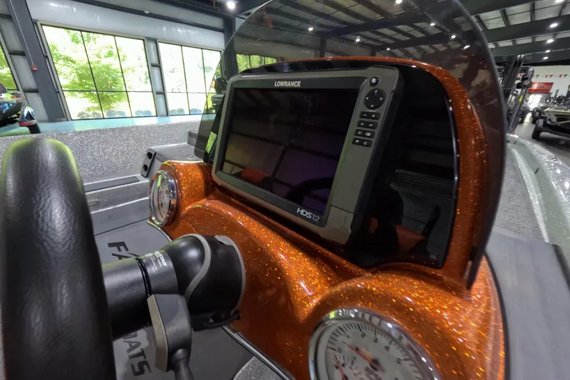 Slide: The Image of Dashboard of a 2021 Falcon Boats 195 with Lowrance HDS-12 display. - 8