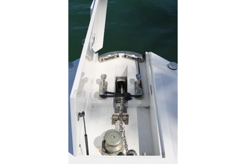 Slide: The Image of Anchor compartment of a 2010 CNM 50 boat with chain and winch. - 16