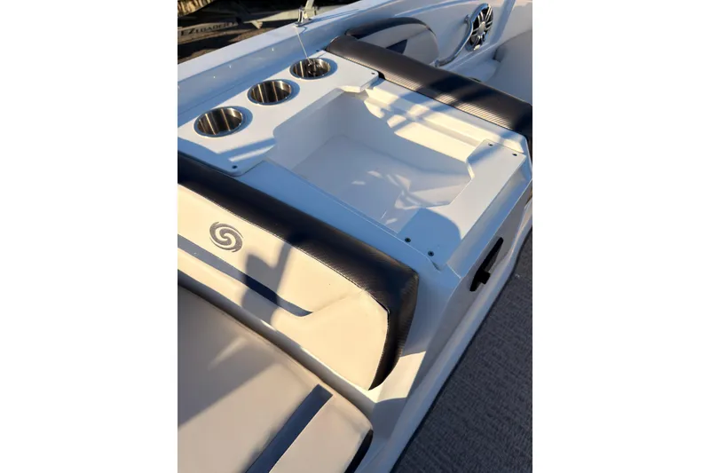 Slide: The Image of 2022 Hurricane SunDeck Sport 205 OB boat interior with cup holders and seating. - 11