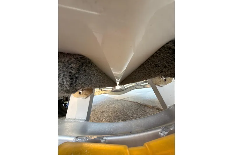 Slide: The Image of Close-up of 2022 Hurricane SunDeck Sport 205 OB boat hull on trailer. - 30