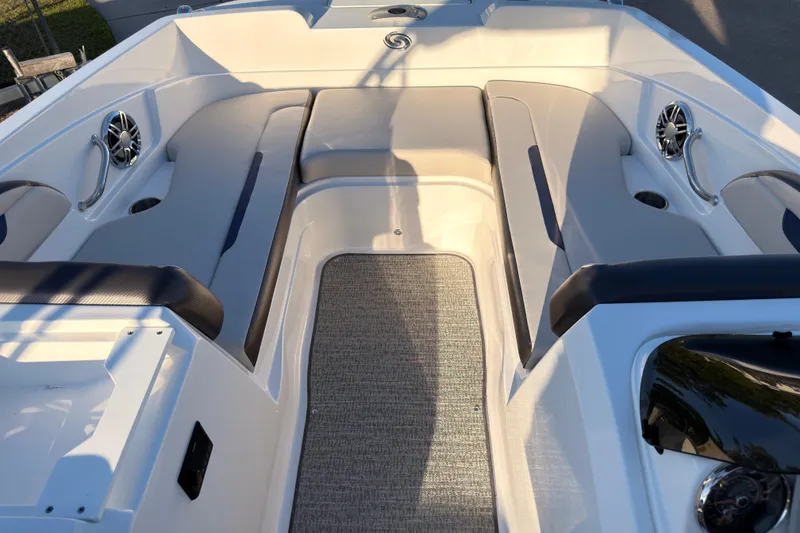 Slide: The Image of 2022 Hurricane SunDeck Sport 205 OB boat interior with spacious seating and modern design. - 5