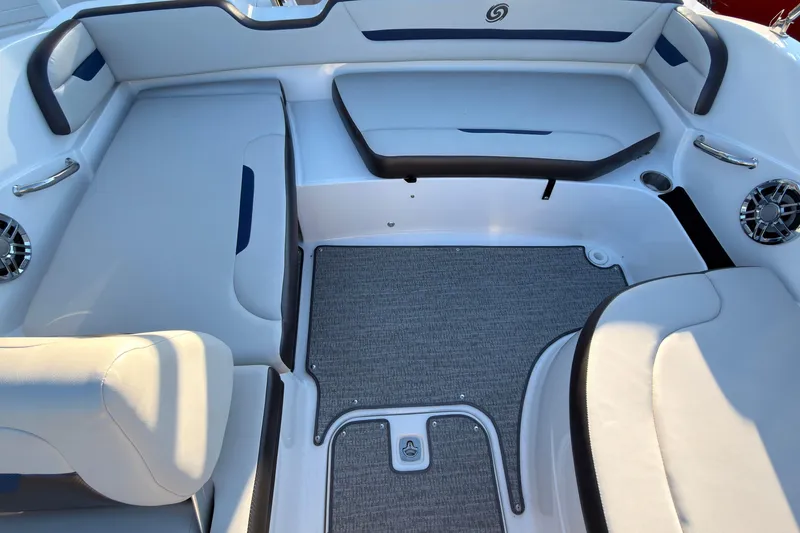 Slide: The Image of Interior view of 2022 Hurricane SunDeck Sport 205 OB boat, featuring spacious seating and modern design. - 8