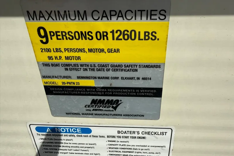 Slide: The Image of Maximum capacity label for 2005 Bennington 2075RL boat, 9 persons or 1260 lbs. - 14