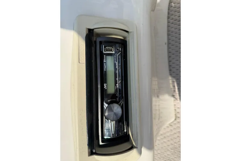 Slide: The Image of JVC stereo system in a 2005 Bennington 2075RL boat dashboard. - 17