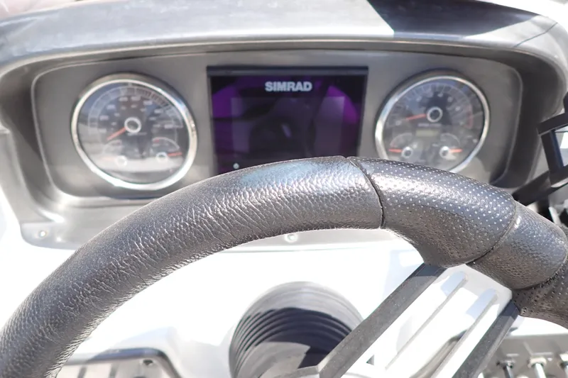 Slide: The Image of Steering wheel and dashboard of 2021 Hurricane SunDeck Sport 185 OB boat. - 13