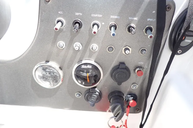 Slide: The Image of Dashboard controls of a 2021 Hurricane SunDeck Sport 185 OB boat. - 15