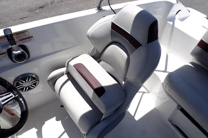 Slide: The Image of Captain's seat on 2021 Hurricane SunDeck Sport 185 OB boat, featuring ergonomic design and premium materials. - 18