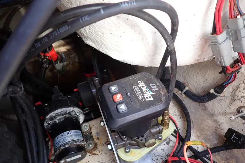 Slide: The Image of Boat engine compartment of 2021 Hurricane SunDeck Sport 185 OB with wiring and components. - 27