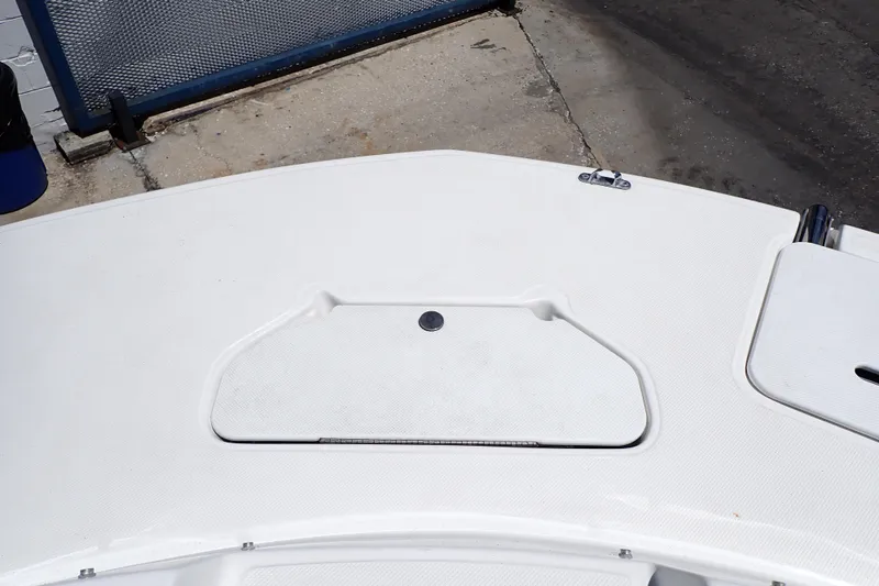 Slide: The Image of Bow deck of 2021 Hurricane SunDeck Sport 185 OB boat, featuring storage hatch. - 29