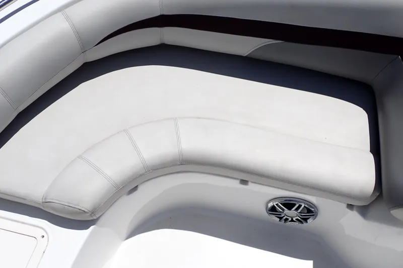 Slide: The Image of 2021 Hurricane SunDeck Sport 185 OB boat seating with speaker detail. - 35